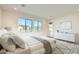 Serene main bedroom features plush bedding, ample natural light, and a calming color palette for a restful retreat at 2121 W Sonoran Desert Dr # 29, Phoenix, AZ 85085