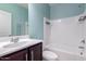 Charming bathroom featuring sleek vanity with chrome faucet, shower-tub, and modern fixtures at 303 W Mammoth Cave Dr, San Tan Valley, AZ 85140