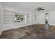 Living room with built-in shelving and tile flooring at 315 W Roma Ave, Phoenix, AZ 85013