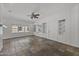 Bright living room with tile floors and ceiling fan at 315 W Roma Ave, Phoenix, AZ 85013