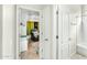 Clean bathroom with a tub and access to bedroom at 6713 E Paradise Ln, Scottsdale, AZ 85254