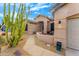 Front entry with walkway and desert landscaping at 6713 E Paradise Ln, Scottsdale, AZ 85254