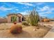 Front yard with cacti and gravel landscaping at 6713 E Paradise Ln, Scottsdale, AZ 85254