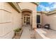 Front entry with decorative door and walkway at 6713 E Paradise Ln, Scottsdale, AZ 85254
