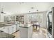 Kitchen with island, stainless steel appliances, and granite counters at 6713 E Paradise Ln, Scottsdale, AZ 85254