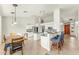 Open kitchen features white cabinets and breakfast bar at 6713 E Paradise Ln, Scottsdale, AZ 85254
