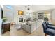 Relaxing living room, featuring a sectional sofa and fireplace at 6713 E Paradise Ln, Scottsdale, AZ 85254