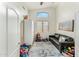 Spacious playroom with a sofa and ample toy storage at 6713 E Paradise Ln, Scottsdale, AZ 85254