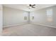 Bright bedroom with carpet flooring and ceiling fan at 6802 N 86Th Ln, Glendale, AZ 85305