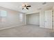 Spacious bedroom with neutral walls and carpet at 6802 N 86Th Ln, Glendale, AZ 85305