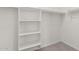 Walk-in closet with shelving and hanging rods at 7578 W Keim Dr, Glendale, AZ 85303