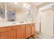 Double vanity bathroom with a walk-in shower at 17547 W Silver Fox Way, Goodyear, AZ 85338