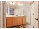 Double vanity bathroom with a walk-in shower at 17547 W Silver Fox Way, Goodyear, AZ 85338