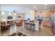 Open kitchen boasting modern appliances and a breakfast bar at 17547 W Silver Fox Way, Goodyear, AZ 85338