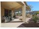 Spacious covered patio with comfortable seating at 17547 W Silver Fox Way, Goodyear, AZ 85338