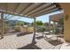 Relaxing patio with built-in grill and pergola at 17547 W Silver Fox Way, Goodyear, AZ 85338