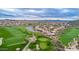 Lush golf course and residential community with scenic mountain views in the distance at 3055 N Red Mountain Mtn # 95, Mesa, AZ 85207