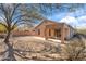 Large backyard featuring desert landscaping and a covered patio, great for outdoor living and entertaining at 3055 N Red Mountain Mtn # 95, Mesa, AZ 85207