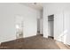 Neutral bedroom featuring sliding closet doors and ensuite bath at 3055 N Red Mountain Mtn # 95, Mesa, AZ 85207