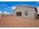 View of the side and back of the home with backyard ready for your personal touch at 31465 N Wet Creek Rd, San Tan Valley, AZ 85143