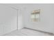 Bright bedroom boasts neutral carpeting, natural light, and convenient closet with double doors at 31465 N Wet Creek Rd, San Tan Valley, AZ 85143