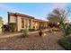 Landscaped backyard with pathway and exterior lighting at 41348 N Congressional Dr, Anthem, AZ 85086