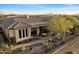 Backyard patio with seating area and mountain views at 41348 N Congressional Dr, Anthem, AZ 85086
