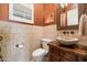 Elegant bathroom with stone sink and tile at 41348 N Congressional Dr, Anthem, AZ 85086
