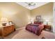 Cozy bedroom with double bed and wood dresser at 41348 N Congressional Dr, Anthem, AZ 85086