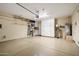 Organized garage with overhead storage and cabinets at 41348 N Congressional Dr, Anthem, AZ 85086