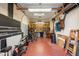 Large garage with ample storage and workshop area at 41348 N Congressional Dr, Anthem, AZ 85086