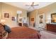 Spacious main bedroom with ensuite bathroom access at 41348 N Congressional Dr, Anthem, AZ 85086