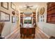 Home office with built-in bookshelves and desk at 41348 N Congressional Dr, Anthem, AZ 85086