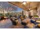 Spacious covered patio with seating and mountain views at 41348 N Congressional Dr, Anthem, AZ 85086