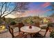 Relaxing patio with table and chairs, mountain views at 41348 N Congressional Dr, Anthem, AZ 85086