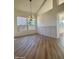 Modern dining room with hardwood floors and a view to kitchen at 6891 W Via Del Sol Dr, Glendale, AZ 85310