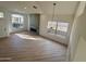 Bright living room with vaulted ceilings, fireplace, and hardwood floors at 6891 W Via Del Sol Dr, Glendale, AZ 85310