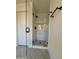Walk-in shower with glass enclosure and modern fixtures at 6891 W Via Del Sol Dr, Glendale, AZ 85310