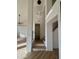 Modern staircase with open risers and a sleek light fixture at 6891 W Via Del Sol Dr, Glendale, AZ 85310