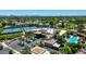 Aerial view of community amenities including tennis courts, pool, and clubhouse at 7272 E Gainey Ranch Rd # 73, Scottsdale, AZ 85258