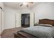 Bedroom with a queen-size bed and access to bathroom at 13015 W Highland Ave, Litchfield Park, AZ 85340