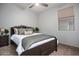 Bedroom with a queen-size bed and ceiling fan at 13015 W Highland Ave, Litchfield Park, AZ 85340