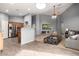 Open concept kitchen with stainless steel appliances and breakfast bar at 13015 W Highland Ave, Litchfield Park, AZ 85340