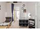 Bedroom with a comfortable chair and access to bathroom at 170 E Guadalupe Rd # 14, Gilbert, AZ 85234