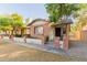 Brick home with a walkway and landscaping at 170 E Guadalupe Rd # 14, Gilbert, AZ 85234