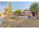 Complex of brick homes with a grassy area at 170 E Guadalupe Rd # 14, Gilbert, AZ 85234