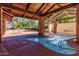 Community hot tub nestled under a covered patio at 170 E Guadalupe Rd # 14, Gilbert, AZ 85234