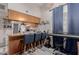 Bright kitchen features wood cabinets, white appliances, and a breakfast bar at 170 E Guadalupe Rd # 14, Gilbert, AZ 85234