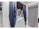 Laundry room with washer, dryer, and storage shelves at 170 E Guadalupe Rd # 14, Gilbert, AZ 85234