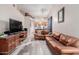 Open living room with a view of the kitchen at 170 E Guadalupe Rd # 14, Gilbert, AZ 85234
